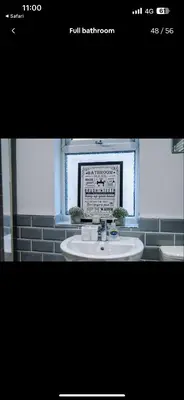a bathroom with a sink and a mirror at Cherry Loft in Liverpool