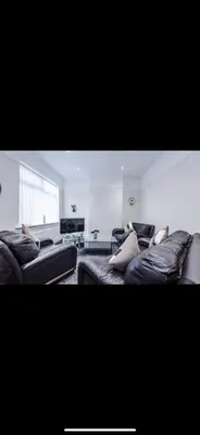 a living room with two couches and a couch at Cherry Loft in Liverpool