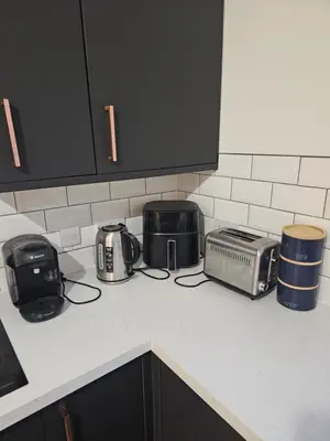 a kitchen counter top with toaster toaster and toasters at Market Quarter, town centre, free parking and wifi in Southport