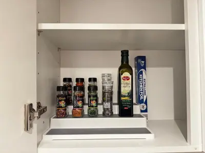 a drawer with a bottle of alcohol and a book at City Link Apartments Perfect Stay for Concert Goers, Football Fans and Contractors, Closer to Liverpool City Centre, Everton, Liverpool Grounds in Liverpool