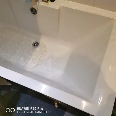 a white bath tub with a sink at Best homestay Close To City Centre in Liverpool