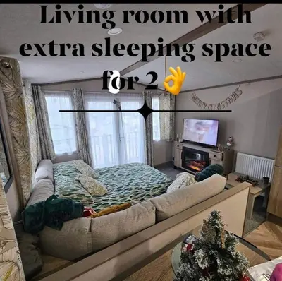 a living room with an extra sleeping space for two at Escape in Carnforth Lodge - Sleeps 6 in Carnforth