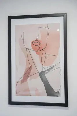 a framed painting of two people at Sevenstay Apartments Fleet Street in Liverpool