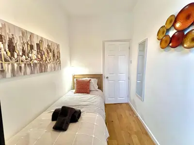 a bedroom with a bed in a room at Modernised 3-bed home in Bamber Bridge, Preston in Bamber Bridge