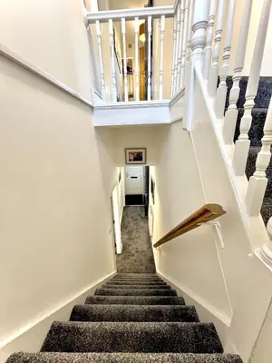 a staircase in a house with stair treads at Ideal 4-bed stay-away-home sleeps 6 in Preston in Preston