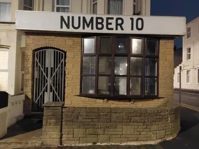 a building with a sign that reads number at Number 10 in Blackpool