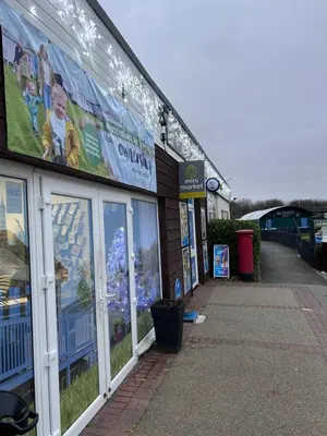 a building with signs on the side of it at Haven Cala gran 2026 spring summer autumn winter breaks up to January 2027 A full action camp for all ages disabled friendly Fleetwood Blackpool Entire home 6 people seaside caravan park in Fleetwood
