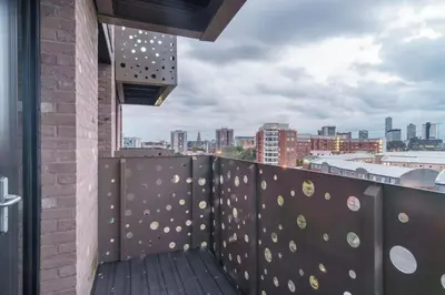 a balcony with a view of a city at Fabulous Studio in Central Liverpool in Liverpool