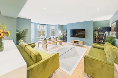 a living room with two couches and a tv at Host & Stay - The Georgian Quarter at Catharine House in Liverpool