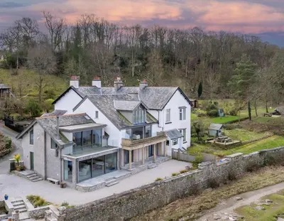 an aerial view of a white house at Beach Haven in Arnside