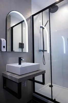 a bathroom with a sink and a shower at Lethbridge Villa 49 Apartment 2 Super Fibre WiFi, free parking in Southport