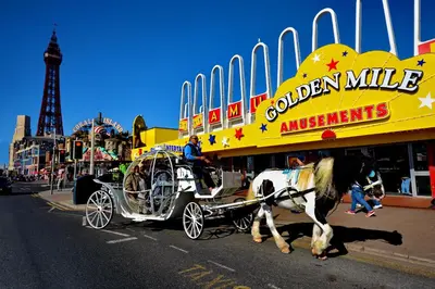 a horse drawn carriage in front of a restaurant at The Derby Hotel in Blackpool