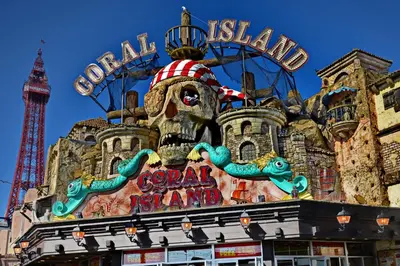 a sign for the carnival island with the eiffel tower at The Derby Hotel in Blackpool