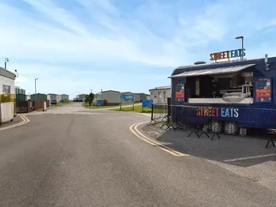 a food truck parked on the side of a road at Ocean View in Lancaster