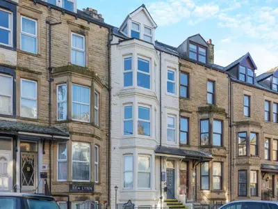 a large brick building with many windows at Pier View - Uk48691 in Lancaster