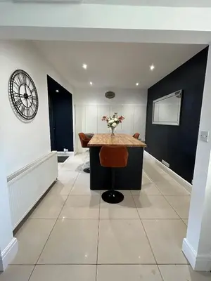 a dining room with a table and chairs at The Willows in Whalley