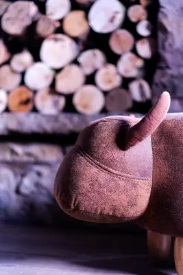 a brown mortar with a thumb up in front of a pile of wood at Luxury modern canal side cottage for families, couples, contractors and dog friendly in Lancashire sleeps 6 in Preston