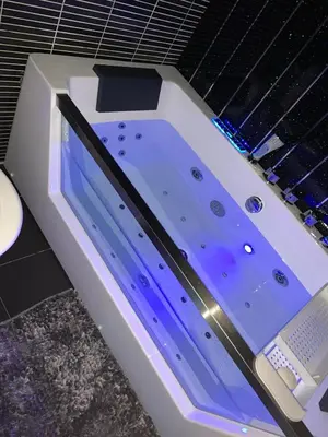 a jacuzziificialificialificialificialificialificialificialificialificialificialificial at house with hot tub in West Derby