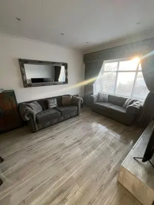 a living room with two couches and a television at Stylish Home Away From Home! 6 Minutes from Beach! in Wirral