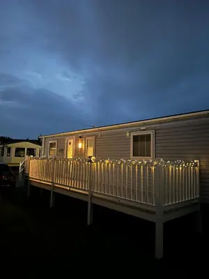 a train with christmas lights on the side of it at Caravan to Hire - CalaGran Fleetwood Blackpool in Fleetwood