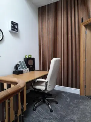 an office with a desk and a white chair at Comfortable family home with amazing Seaviews in Fleetwood