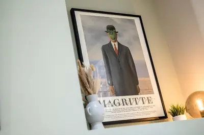 a picture of a man in a suit and a mask at Picasso's Place Liverpool Apt Sleeps 9 in Liverpool