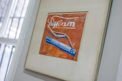 a picture of a sign hanging on a wall at Picasso's Place Liverpool Apt Sleeps 9 in Liverpool