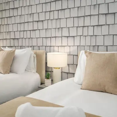 a bedroom with two white beds and a lamp at Liverpool 3 Bedroom Contractor Stay Cherry House in Liverpool