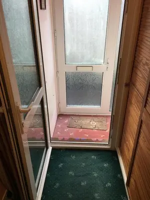 an open door with a window in a room at Book 3 or more nights get one night free !!! in Bare