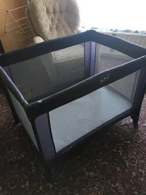 a tv stand with a teddy bear on top of it at Book 3 or more nights get one night free !!! in Bare