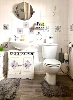 a bathroom with a toilet and a sink and a mirror at Anfield Goodison Stanley Park Liverpool in Liverpool