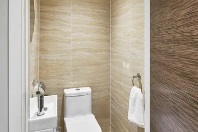 a bathroom with a toilet and a sink at Host & Stay - Chic Townhouse by the Docks in Liverpool