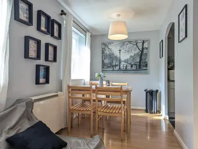 a dining room with a table and chairs at Vintage 2-Bed City Centre Gem Free Parking in Liverpool