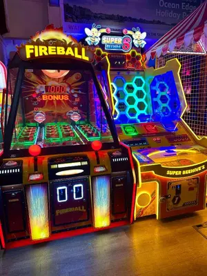 a fire ball arcade game in a room at Ocean Pearl Home in Heysham