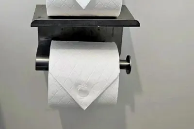 a roll of toilet paper on a toilet paper dispenser at House - Sleeps 11 - Parking - Station Close in Preston