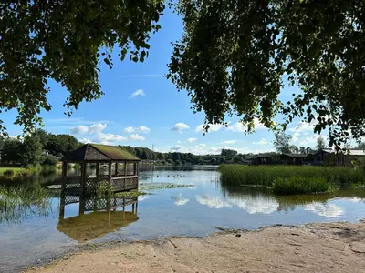 a gazebo sitting in the middle of a river at Lakeside 18 in Carnforth