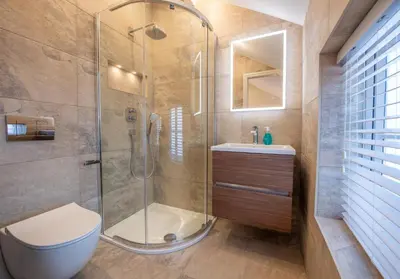 a bathroom with a shower and a toilet and a sink at Olive Lodge Lytham in Lytham St Annes