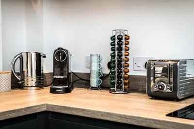 a kitchen counter with appliances on a counter top at Chavasse Cove Sleeping 6 Guests With Parking in Liverpool