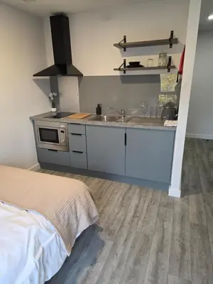 a kitchen with a sink and a stove at URBAN HUB Student Accommodation in Preston