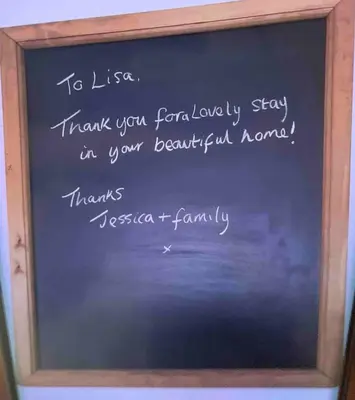 a chalkboard with a message written on it at Seaside Suites sleep 8 in Blackpool