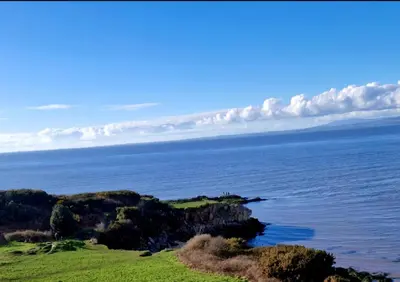an island in the middle of the ocean at Coastal Retreat Lodge in Morecambe