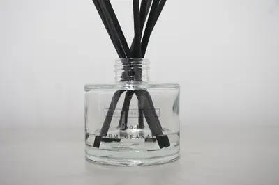 a glass vase filled with water on a table at Spacious Home, Central Liverpool, Sleeps 9, 2 Bathroom, Free Parking in Liverpool