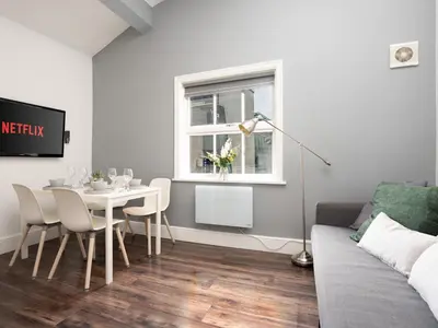 a living room with a table and a couch at Flat 3, Colquitt St, 1 Bed, L1 - Pass the Keys in Liverpool