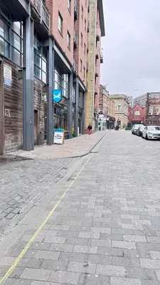 an empty street in a city with buildings at Flat 3, Colquitt St, 1 Bed, L1 - Pass the Keys in Liverpool