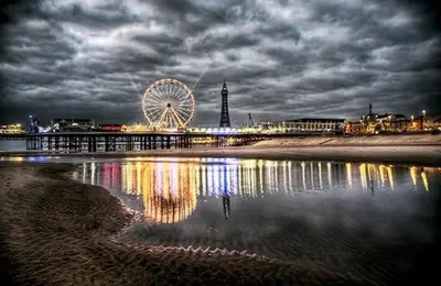 a ferris wheel on the beach at night at Oak Suite - 2 Bed - Sleeps 4 - Central Blackpool in Blackpool