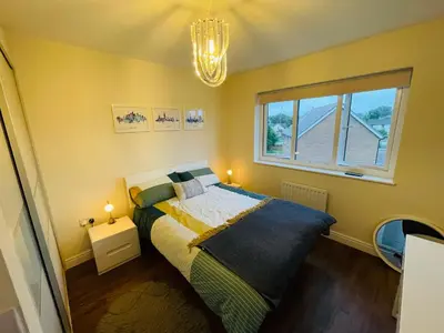 a bedroom with a bed and a window at Small Double Room in Lancaster Riverside - 15 Minutes Walk to City Centre in Torrisholme
