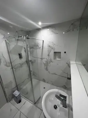 a bathroom with a shower and a sink at Small Double Room in Lancaster Riverside - 15 Minutes Walk to City Centre in Torrisholme
