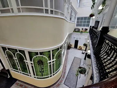 an overhead view of a building with a balcony at Lennon Place in Liverpool