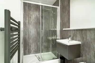 a bathroom with a shower and a sink at Stunning 2 Bedroom Apartment in Liverpool w Views in Liverpool