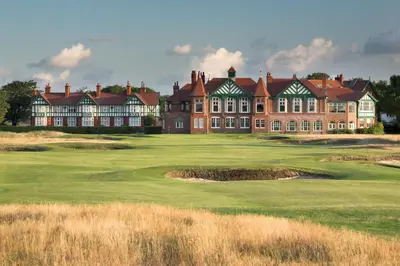 a large building on a golf course with a green at Fairhaven View Apartments - Lytham St Annes in Lytham St Annes